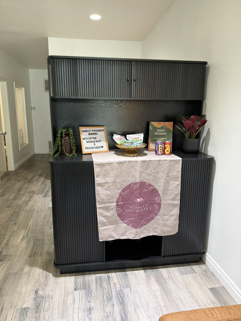 Welcome station with Scarlet Psychiatry Nursing signage