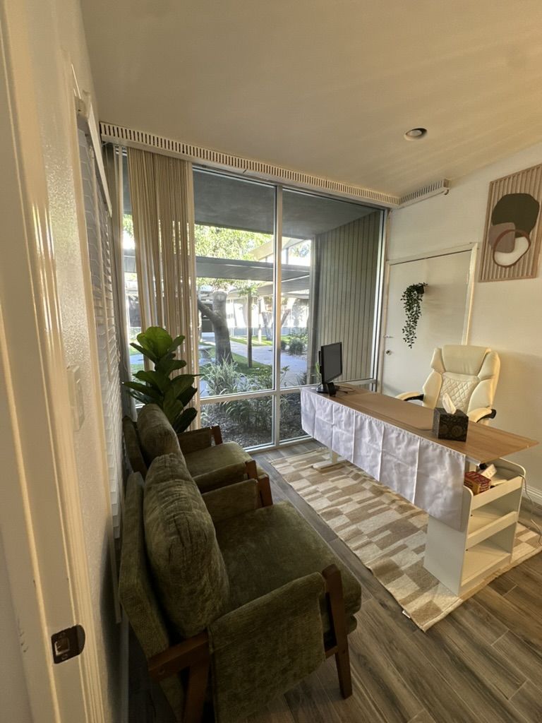 Consultation room with seating and natural light